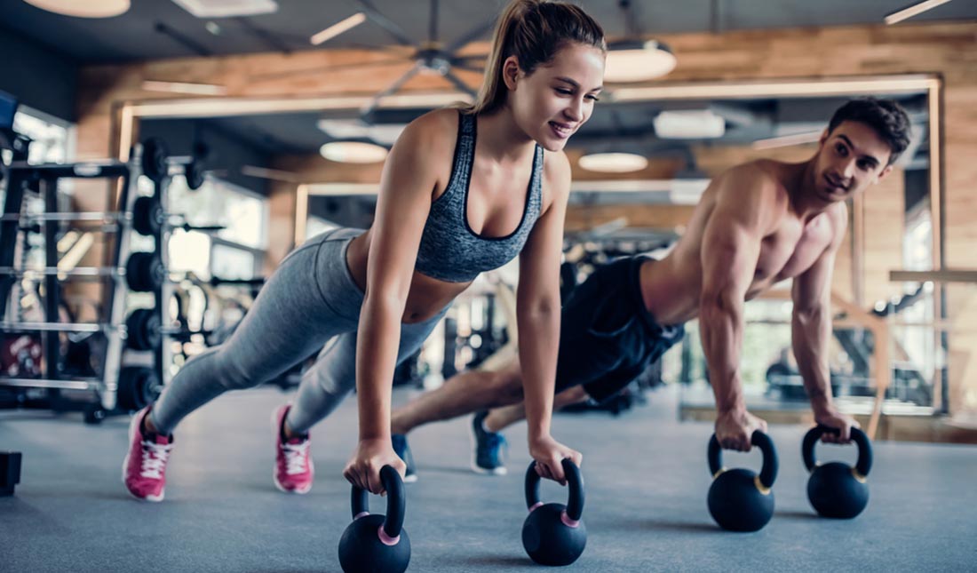 couple working out at gym