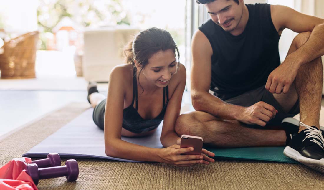 couple exercising at home