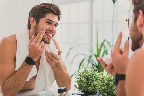 man smiling in mirror